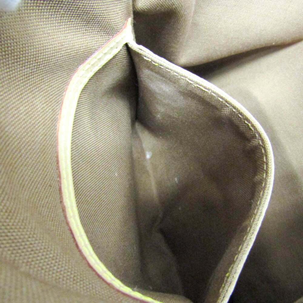 LOUIS VUITTON Authentic Brown Monogram Backpack - Picture 12 of 14